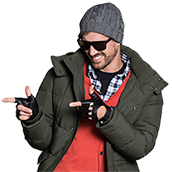 Man wearing puffy winter jacket, beanie, and sunglasses giving finger guns wearing Chariot fingerless gloves